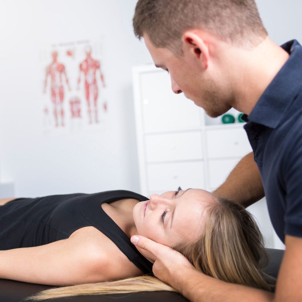 physio performing a consultation