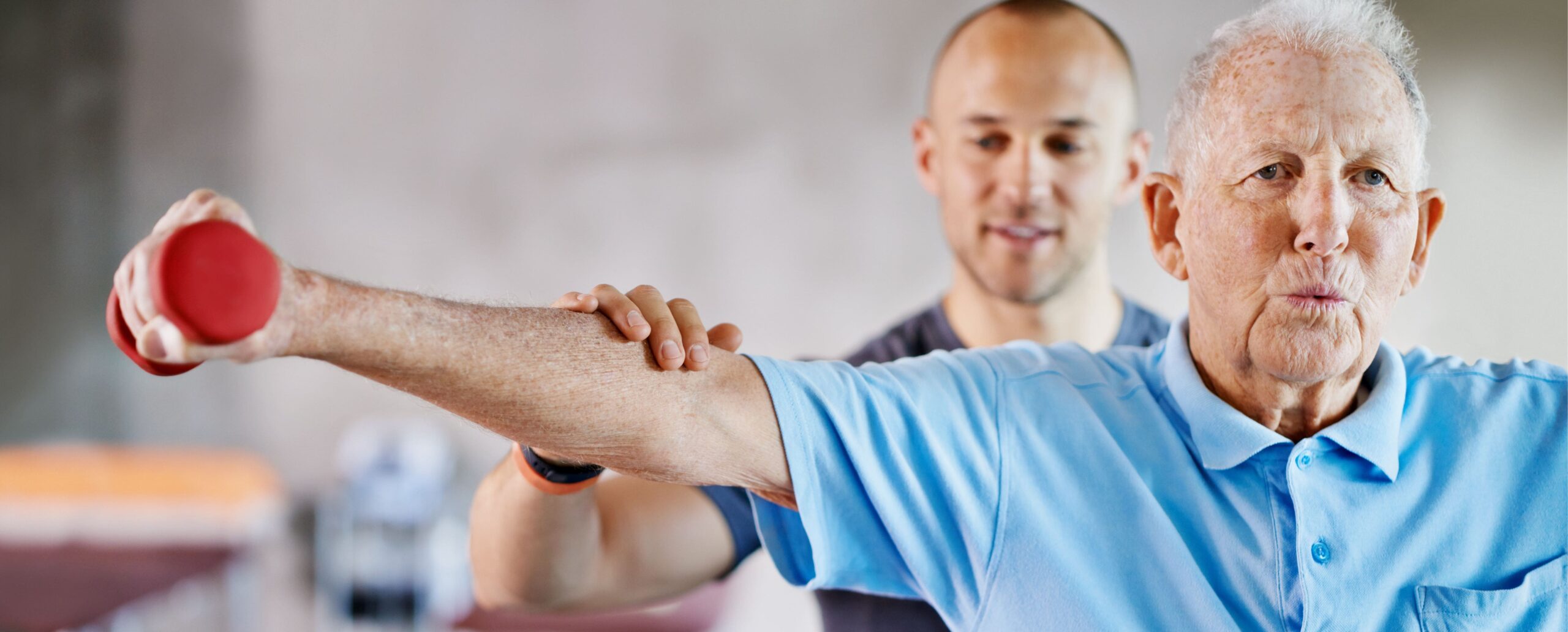 physio helping man